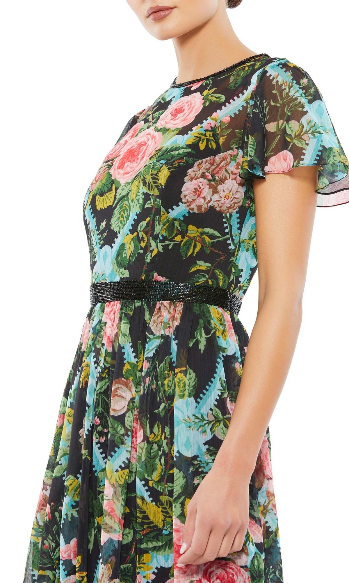 Woman wearing the Mac Duggal 9149 Print Midi Wedding-Guest Dress, a short sleeve black sheer floral-print style with cinched waist, shown from shoulders to knees.